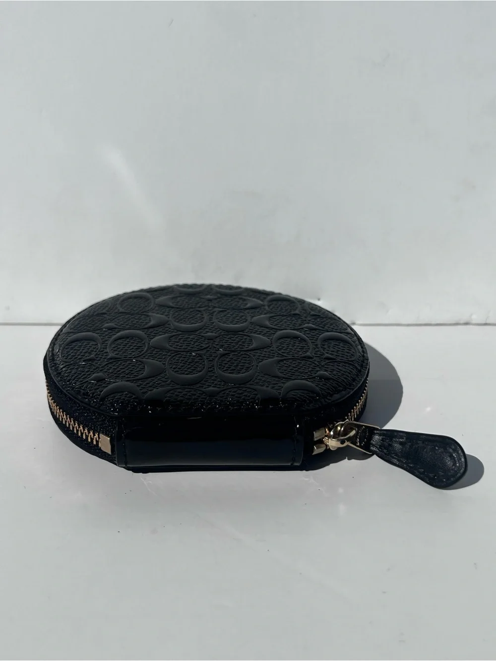 Coach black round